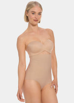 Woman wearing a beige hi-brief on a white background