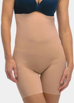 Beige shapewear Hi-Bermuda worn under a blue bra on a white background