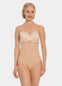 Woman wearing a beige thong on a white background