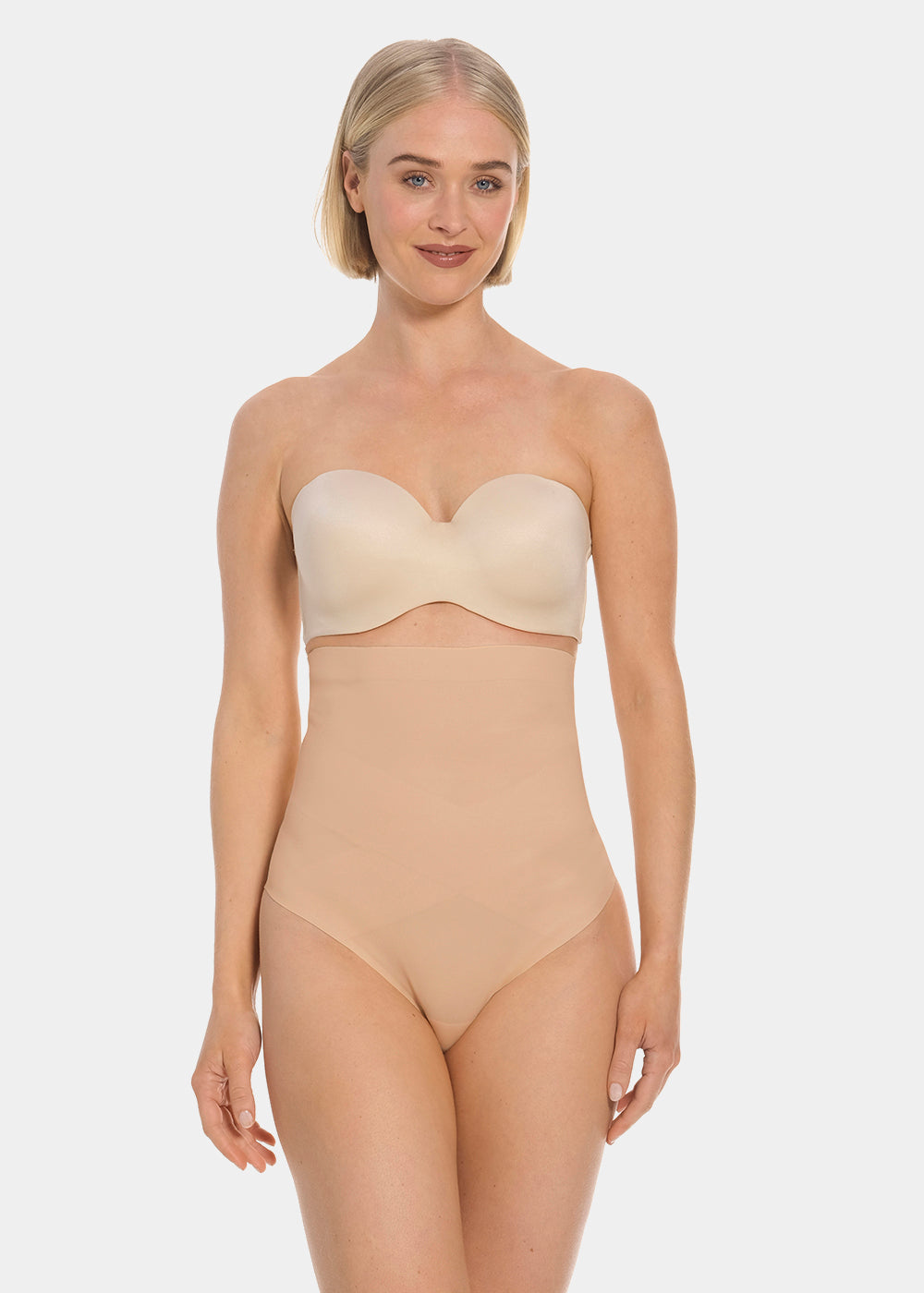 Woman wearing a beige thong on a white background