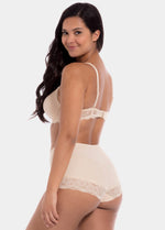 Latte mid-waist shaping brief worn by a model in a back-facing standing position, featuring firm shaping with built-in powernet support, smooth breathable fabric, and flat invisible lace for a sculpted, seamless fit.