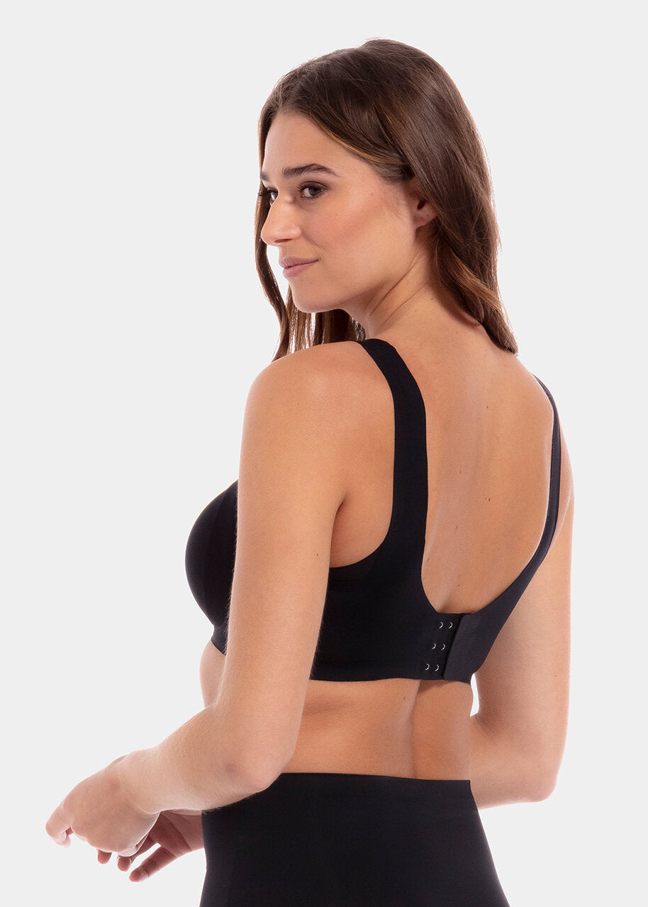 A model wearing a Black Sensual Bra with a grey background