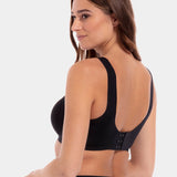A model wearing a Black Sensual Bra with a grey background