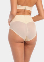 Back view of a model wearing Sheer & Sexy Brief in latte, mid-waist shaping brief. Smooth fabric with sheer mesh panels and special lift zone at the buttocks, featuring seamless edges for invisible wear.