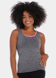 A woman wearing a gray Active Bra Top with pink trim.