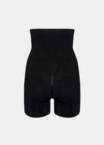 Front view of a model wearing Comfort Shaper in black, high-waist seamless shaping shorts. Stretchable fabric providing medium shaping for abdomen, waist, back, and thighs, with silicone-trimmed waistband and leg openings and a reinforced lift zone for the bottom.