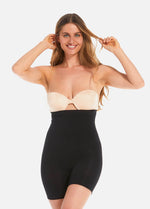 Front view of a model wearing Comfort Shaper in black, high-waist seamless shaping shorts. Stretchable fabric providing medium shaping for abdomen, waist, back, and thighs, with silicone-trimmed waistband and leg openings and a reinforced lift zone for the bottom.