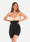Front view of a model wearing Comfort Shaper in black, high-waist seamless shaping shorts. Smooth stretchable fabric providing medium shaping for tummy, waist, hips, and thighs, with silicone trim at waistband and leg openings and a reinforced zone lifting the bottom.