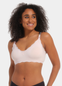Front view of a model wearing Mama Lace Bralette in rose, seamless wire-free nursing bra. Stretch fabric cups with removable pads, clip-down cups for nursing, adjustable straps, and lace trim along the edges visible.