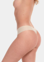 A latte thong underwear featuring smooth, seamless fabric with laser-cut edges, and a cotton crotch lining. Shown from a side view