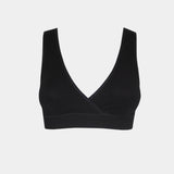 Still product image of Bamboo Soft Bra in black, seamless wire-free bra made with bamboo fibers. Cross-front V-neck, supportive underbust band, wider straps, and smooth back visible for comfort and invisible wear.
