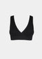 Still product image of Bamboo Soft Bra in black, seamless wire-free bra made with bamboo fibers. Cross-front V-neck, supportive underbust band, wider straps, and smooth back visible for comfort and invisible wear.