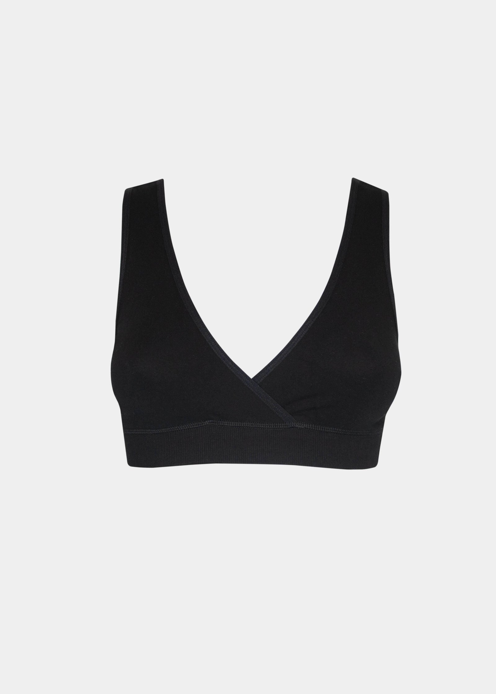 Still product image of Bamboo Soft Bra in black, seamless wire-free bra made with bamboo fibers. Cross-front V-neck, supportive underbust band, wider straps, and smooth back visible for comfort and invisible wear.