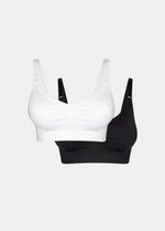 Still product image of Mama Comfort Nursing Bra in white and black, seamless wire-free nursing bras. Two bras shown flat with adjustable straps, clip-down cups, and smooth stretchable fabric visible.