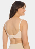 Back view of a model wearing Mama Comfort Nursing Bra in latte, seamless wire-free nursing bra. Adjustable straps and hook-and-eye closure visible, with smooth stretchable fabric and straight back design.