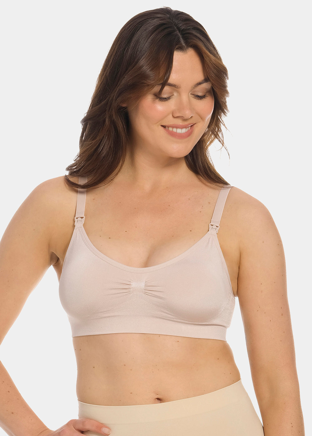 Front view of a model wearing Mama Comfort Nursing Bra in rose, seamless wire-free nursing bra. Clip-down cups, adjustable straps, and smooth stretchable fabric visible, designed for nursing access and support.