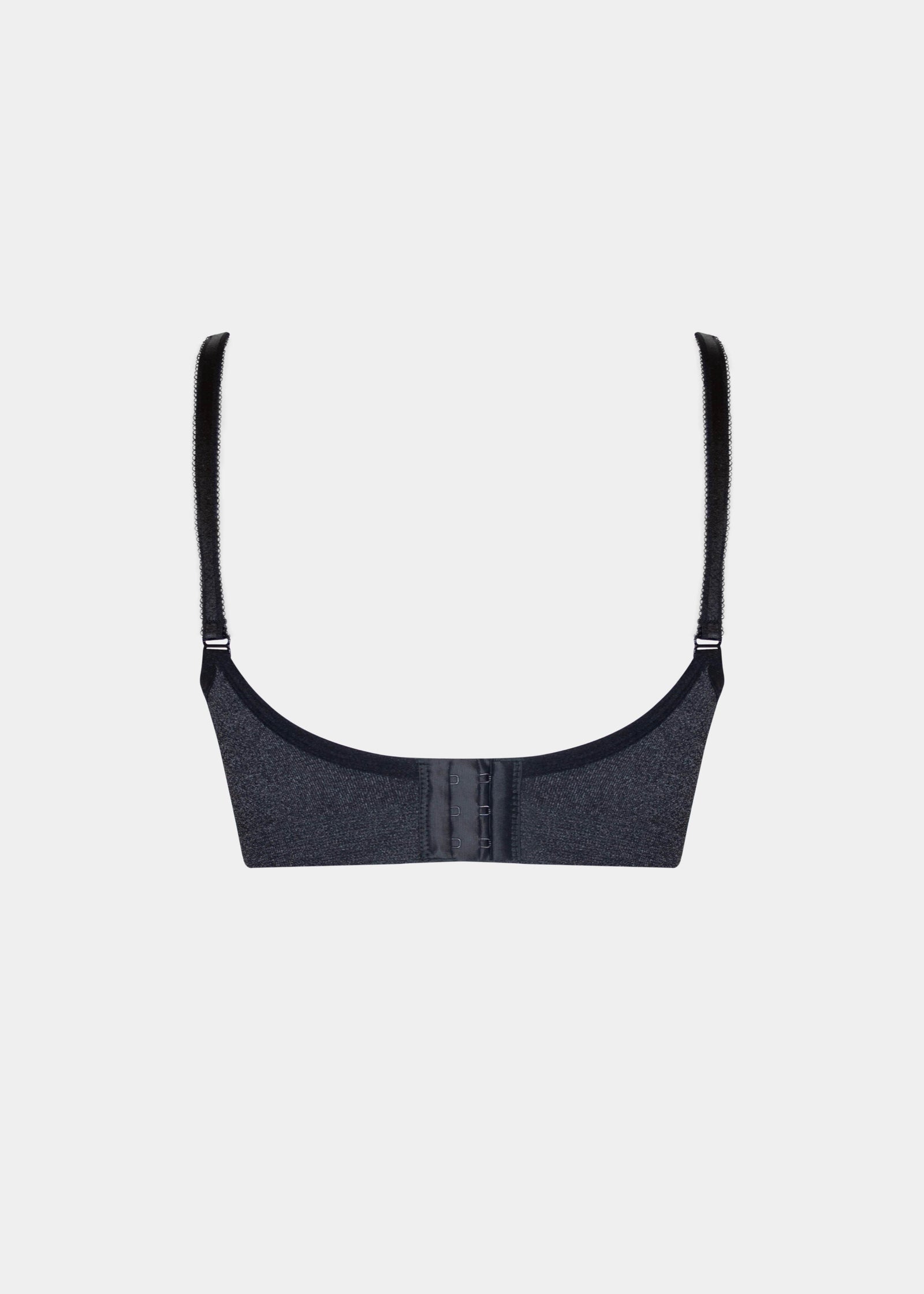 Still product image of Mama Nursing Bra Dots in black shown from the back. Seamless wire-free nursing bra with adjustable straps, hook-and-eye closure, and smooth dotted fabric back panel.