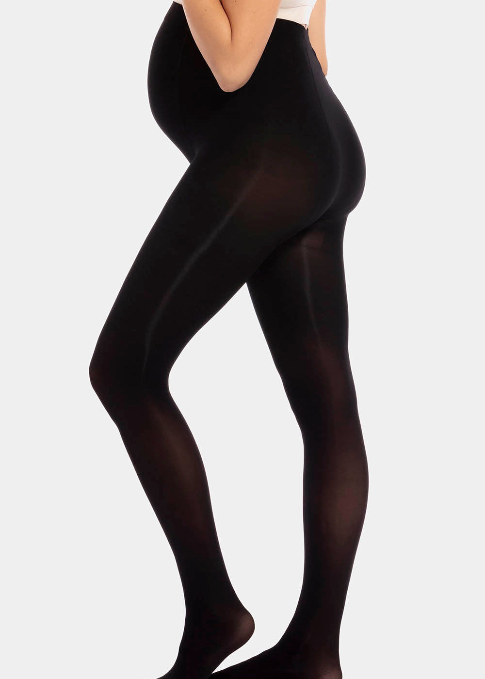Back view cropped image of a model wearing Mama Supporting Tights in black, 80 denier maternity tights. Seamless opaque fabric covering lower back, hips, and upper legs, showing smooth stretchable material and invisible finish.