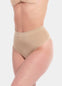 Front view of a model wearing the cappuccino-colored Comfort Thong, featuring soft, seamless fabric with light shaping support and a smooth, invisible finish under clothing.