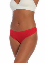 A red thong underwear featuring smooth, seamless fabric with laser-cut edges, and a cotton crotch lining.