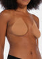 Front view of a model wearing the mocha-colored Beverly Hills Secret breast lift tapes, showcasing the ultra-thin adhesive tapes that lift and support the bust while creating a smooth, invisible look under clothing.