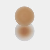 Still product image of the caramel-colored MAGIC Nipples silicone nipple covers, showcasing the ultra-thin, soft covers designed for discreet, invisible coverage without adhesive.