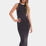 Front view of a model wearing the doppio-colored Bodycon Dress, featuring a sleeveless midi-length design with ultra-stretchy, seamless fabric that hugs the curves and provides flattering bust support.