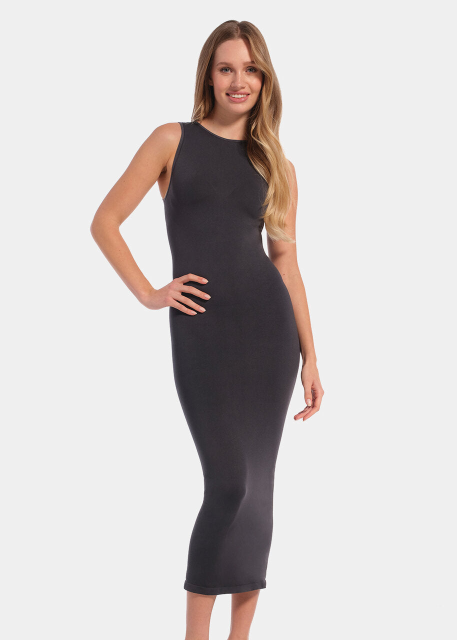 Front view of a model wearing the doppio-colored Bodycon Dress, featuring a sleeveless midi-length design with ultra-stretchy, seamless fabric that hugs the curves and provides flattering bust support.