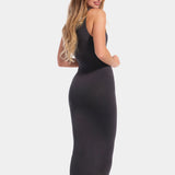 Back view of a model wearing the doppio-colored Bodycon Dress, showcasing the sleeveless midi-length silhouette, seamless curve-hugging fit, and smooth finish with a secure hem that stays in place.