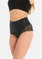 Front view close-up of a model wearing Tummy Shaper Lace in black, mid-waist shaping brief with lace detailing. Double-layer waistband and smooth fabric front with lace edges visible for seamless, invisible wear under clothing.