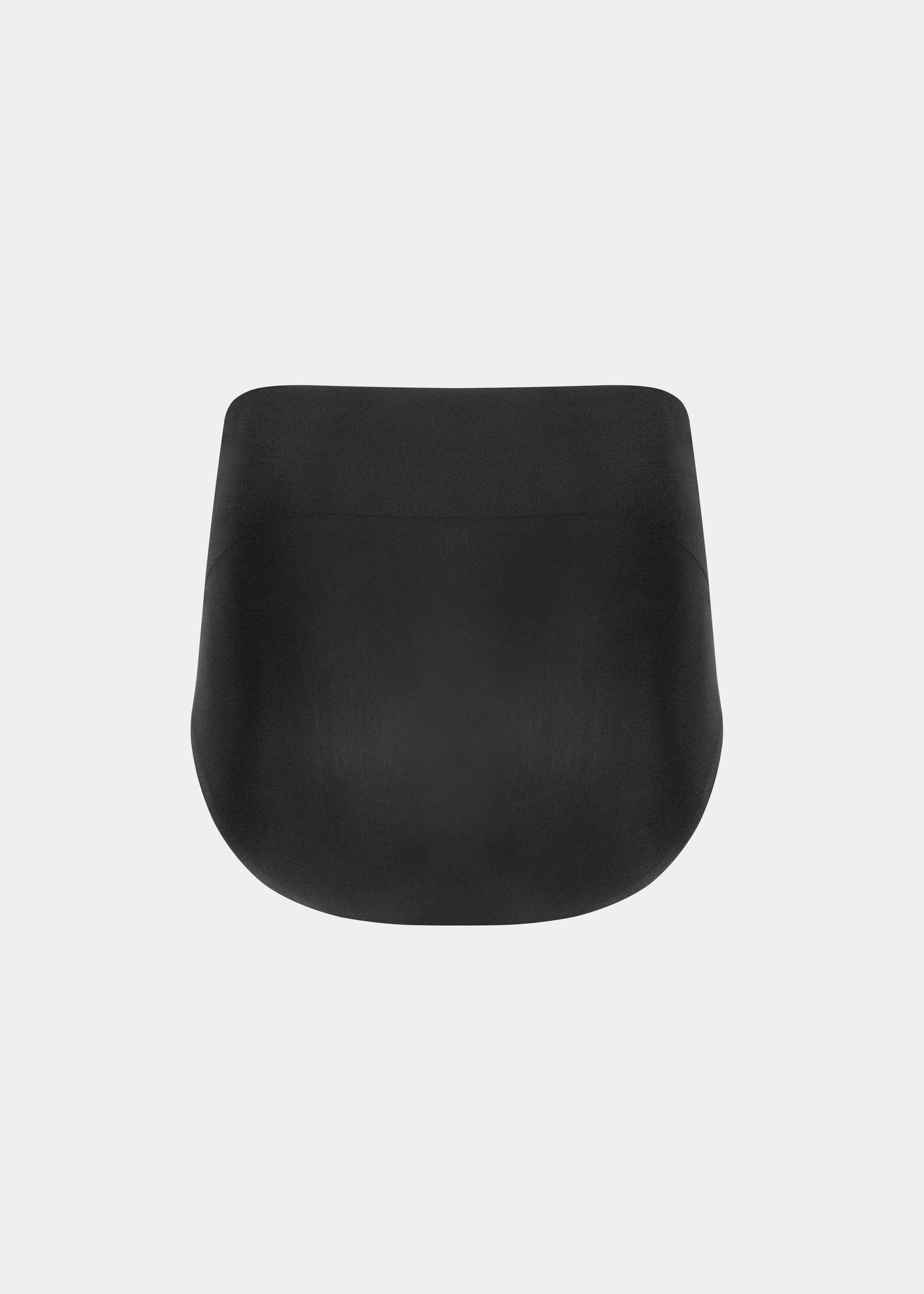 Still product image of Tummy Shaper in black shown from the back. Mid-waist shaping brief with smooth, seamless fabric, full back coverage, and invisible edges for firm shaping at the lower back.