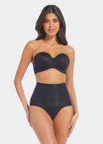 Front view of a model wearing Tummy Shaper in black, mid-waist shaping brief with double-layer waistband. Seamless design with smooth fabric and full front coverage, providing firm shaping at the tummy area.