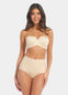 Front view of a model wearing Tummy Shaper in latte, mid-waist shaping brief with double-layer waistband. Seamless design with smooth fabric and full coverage front, providing firm shaping at the tummy area.