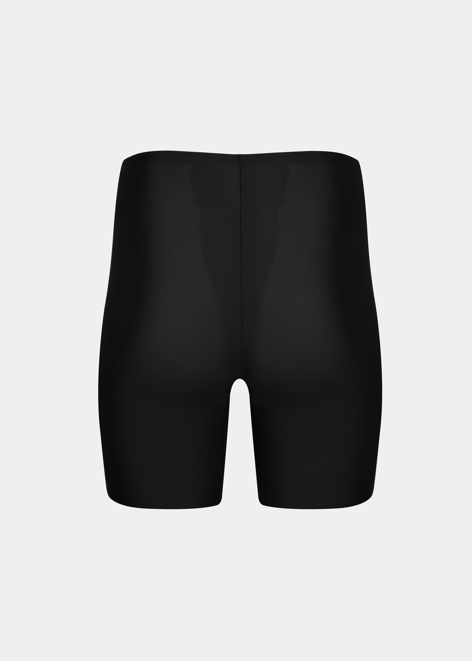 Still product image of Everyday Shaper Bermuda in black shown from the back. Mid-waisted seamless shapewear shorts with long legs to mid-thigh, smooth fabric, and seamless edges for invisible shaping under clothing.