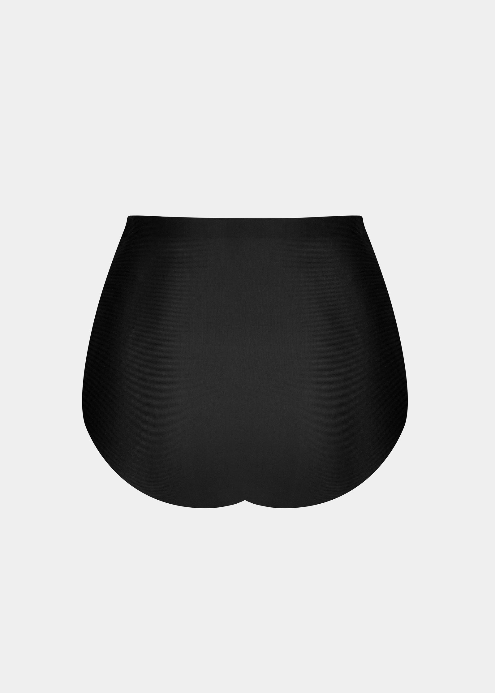 Still product image of Everyday Shaper Brief in black shown from the back. Mid-waisted seamless shapewear brief with smooth, lightweight fabric and full back coverage, designed for invisible shaping under clothing.