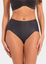 Back view of a model wearing Everyday Shaper Brief in black, mid-waisted seamless shapewear brief. Cropped image showing smooth fabric, seamless edges, and full back coverage designed for invisible shaping under clothing.