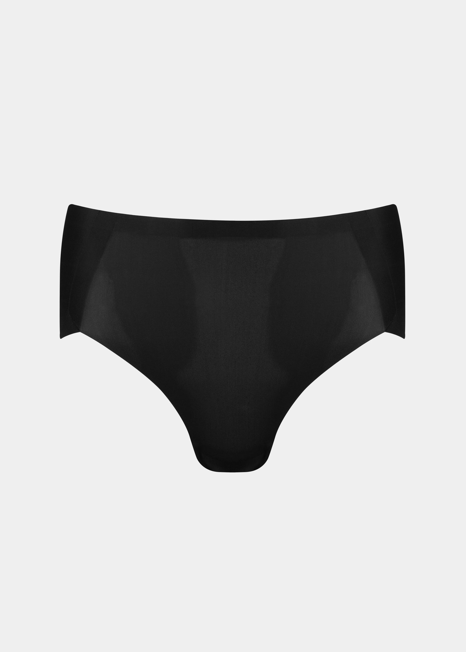 Still product image of Everyday Shaper Shorty in black, mid-waisted seamless shapewear shorts. Smooth fabric with short leg length, seamless waistband, and invisible finish designed for light shaping under clothing.