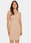 Front view of a model wearing Everyday Underdress in cappuccino, lightweight underdress with V-neckline and adjustable straps. Relaxed fit garment with smooth, flowy fabric and mid-thigh length designed for invisible layering under clothing.