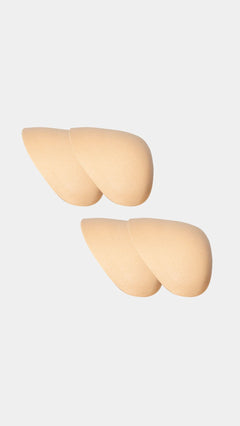 Beige silicone 2-pack Shoulderpads on a white background