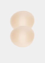 Still product image of MAGIC Cups in latte showing the inside surface. Soft interior with smooth finish and seamless edges, designed for placement inside bras or garments to shape the breast.