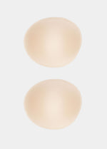 Still product image of MAGIC Cups in latte, soft bra inserts. Full coverage cups with smooth surface, seamless edges, and natural curved shape designed to provide subtle shaping inside bras or clothing.
