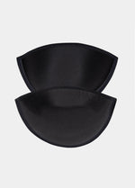 Still product image of Watersoft Push-Up Bra pads in black, water and oil-filled silicone inserts. Two full cup pads shown overlapping, with smooth surface, rounded shape, and seamless edges visible.