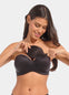 Front view of a model inserting Watersoft Push-Up Bra pads in black, water and oil-filled bra inserts. Full cup pad placed inside bra, showing added volume with smooth surface and curved shape.