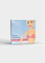 Still product image of Bikini Swim Pad in clear shown in front packaging box. Rectangular box displaying transparent silicone adhesive push-up pads, with product image and branding visible on the front panel.