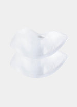 Still product image of Silicone Curves in clear, transparent silicone push-up pads. Crescent-shaped inserts with smooth surface and seamless edges, designed to be placed inside a bra for added lift and volume.