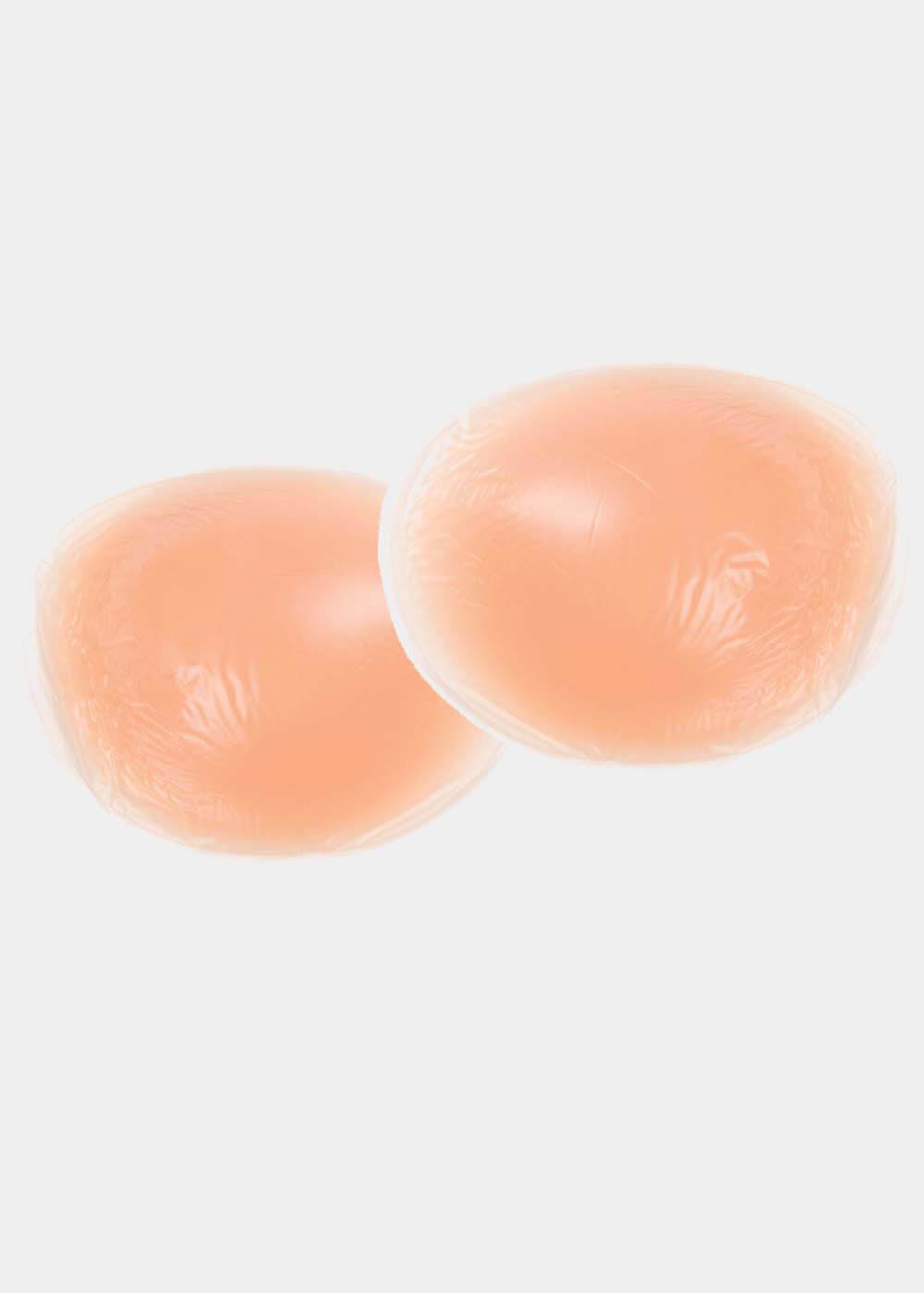 Still product image of Silicone Full Cup in latte, nude silicone bra inserts. Full coverage cups with smooth matte surface and curved shape, designed to add volume and fullness to the bust.