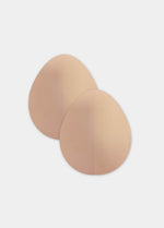 Still product image of the caramel-colored Beverly Hills Secret breast lift tapes, showcasing the ultra-thin adhesive tape pieces designed to lift and support the bust for an invisible finish under clothing.