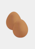 Still product image of the mocha-colored Beverly Hills Secret breast lift tapes, showcasing the ultra-thin adhesive tape pieces designed to lift and support the bust for an invisible finish under clothing.
