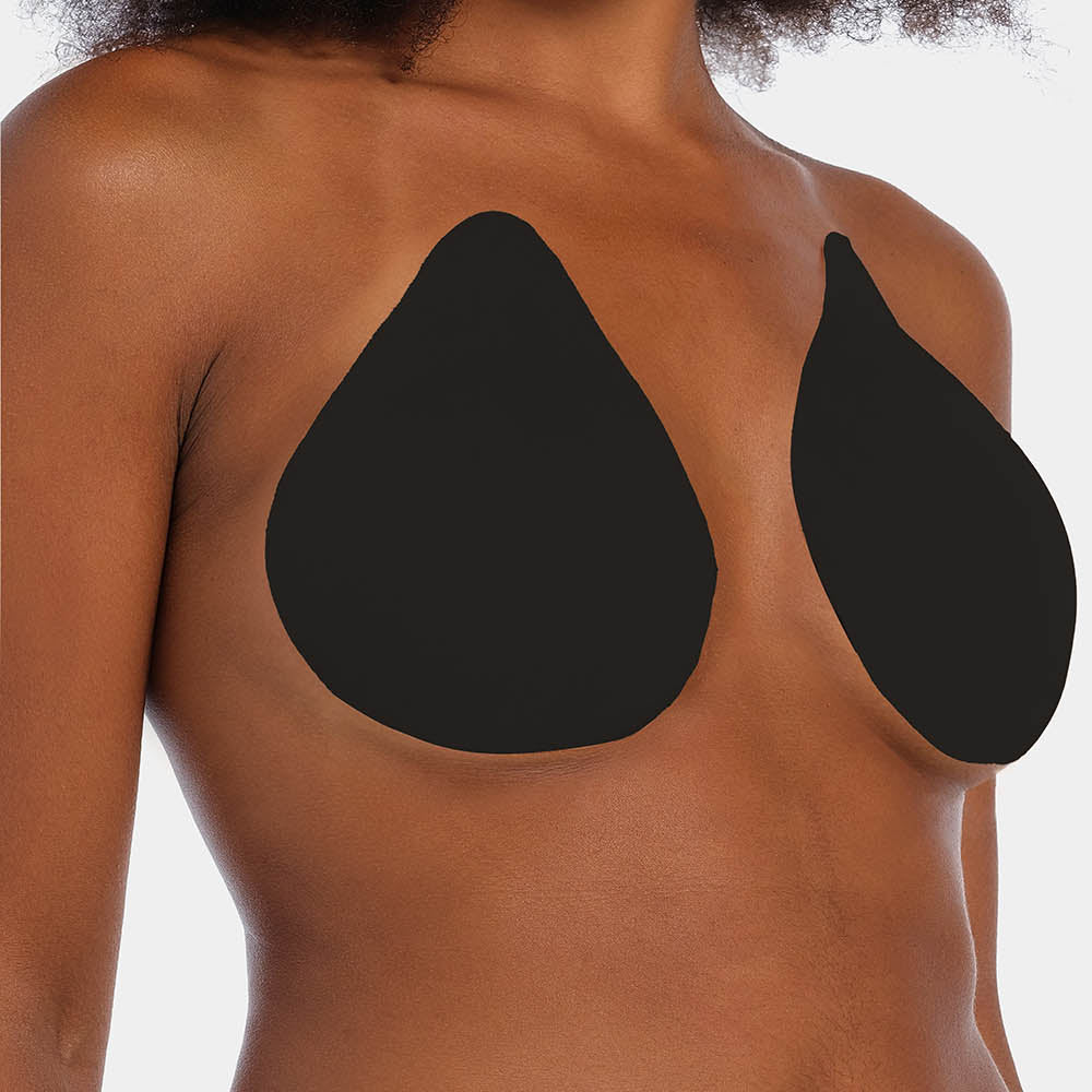 Front view of a model wearing the black Beverly Hills Secret breast lift tapes, showcasing the ultra-thin adhesive tapes that lift and support the bust while creating a smooth, invisible look under clothing.