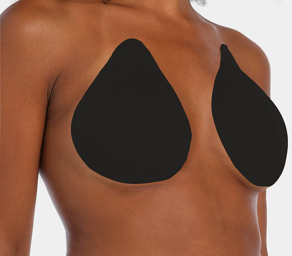 Front view of a model wearing the black Beverly Hills Secret breast lift tapes, showcasing the ultra-thin adhesive tapes that lift and support the bust while creating a smooth, invisible look under clothing.